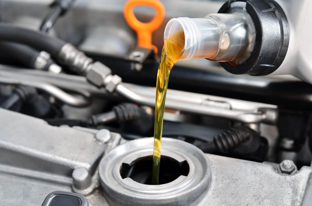 How much oil should you pour into the engine?