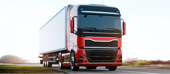Modern Red Freight Truck on the Road A modern red freight truck with a white trailer driving on a rural road.