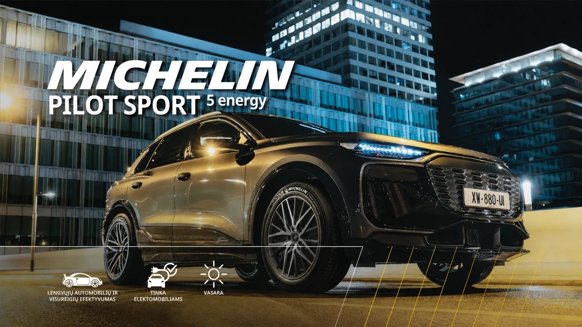 "Michelin Pilot Sport 5 Energy" padangų reklama Elegantiškas automobilis su "Michelin Pilot Sport 5" energetinėmis padangomis, apšviestas naktį su moderniais pastatais fone.